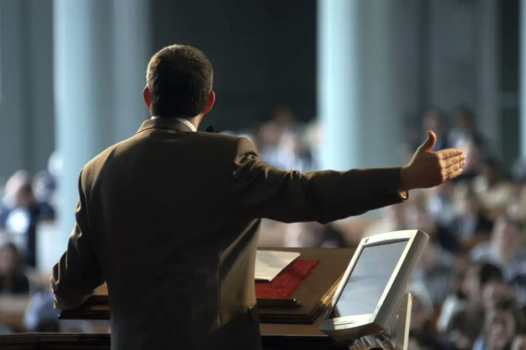 human pastor preacher in church