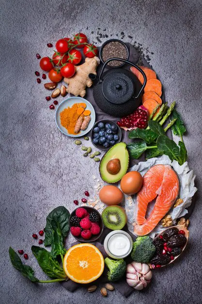 balanced-nutrition-concept-clean-eating-diet-assortment-healthy-food-superfood-ingredients-cooking-kitchen-table-top-view-flat-lay-background-copy-space_