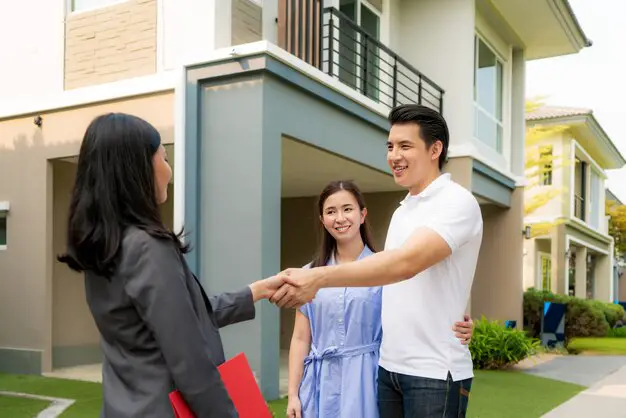happy-asian-couple-looking-their-new-house_