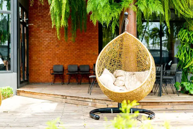 elevating your living space patio with wicker swing chair