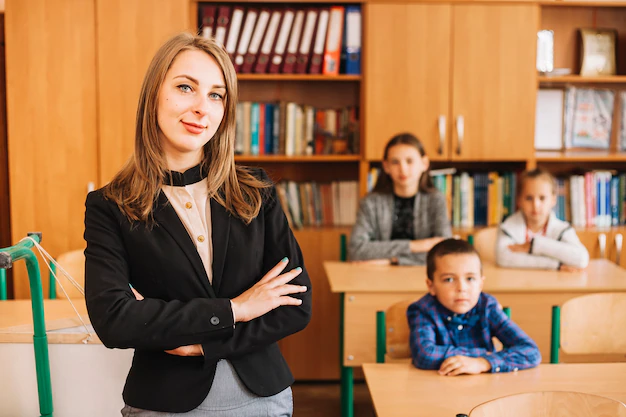 school-teacher-background-sitting-desk-students_