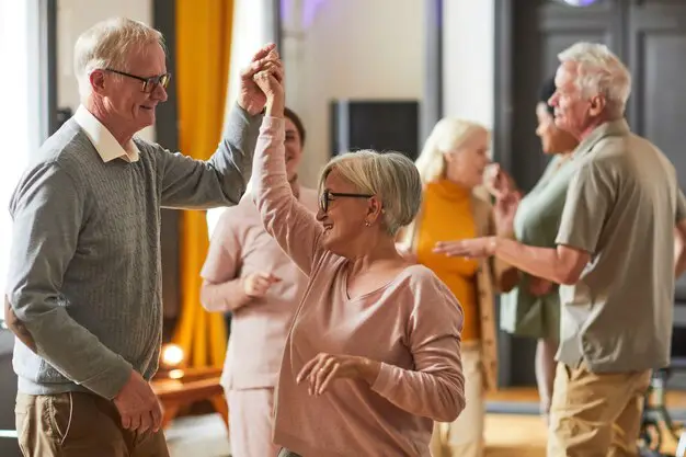 senior-people-dancing-retirement-home_