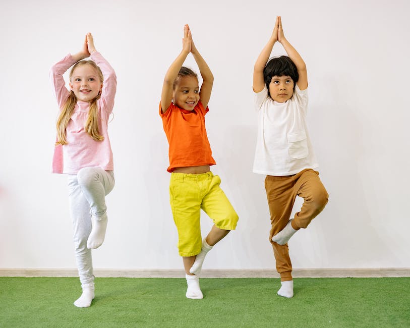 A group of children, happily participating in one of the at-home exercises described in the text, creating a joyful and active environment.